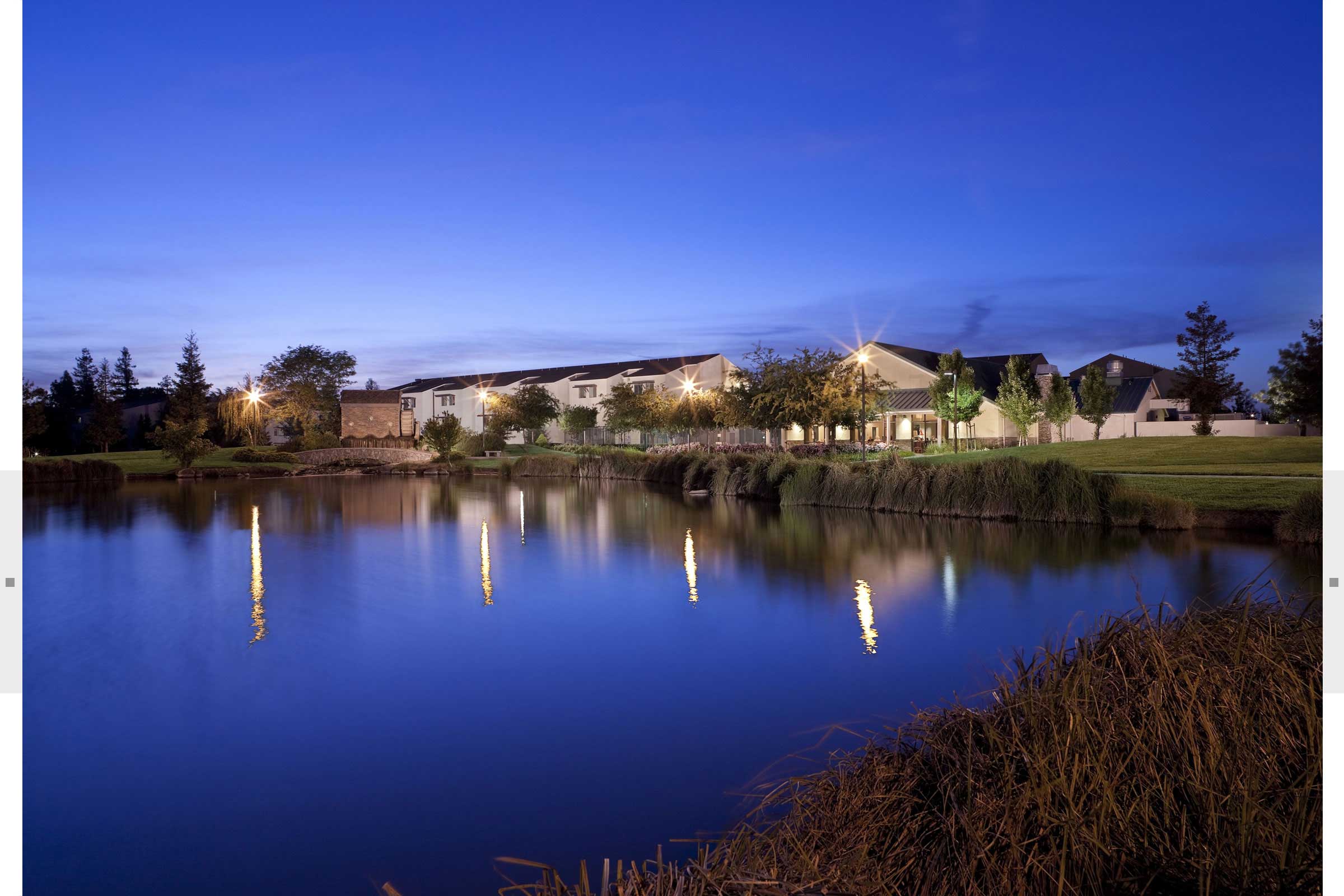 CSU evening exterior with pond in foreground