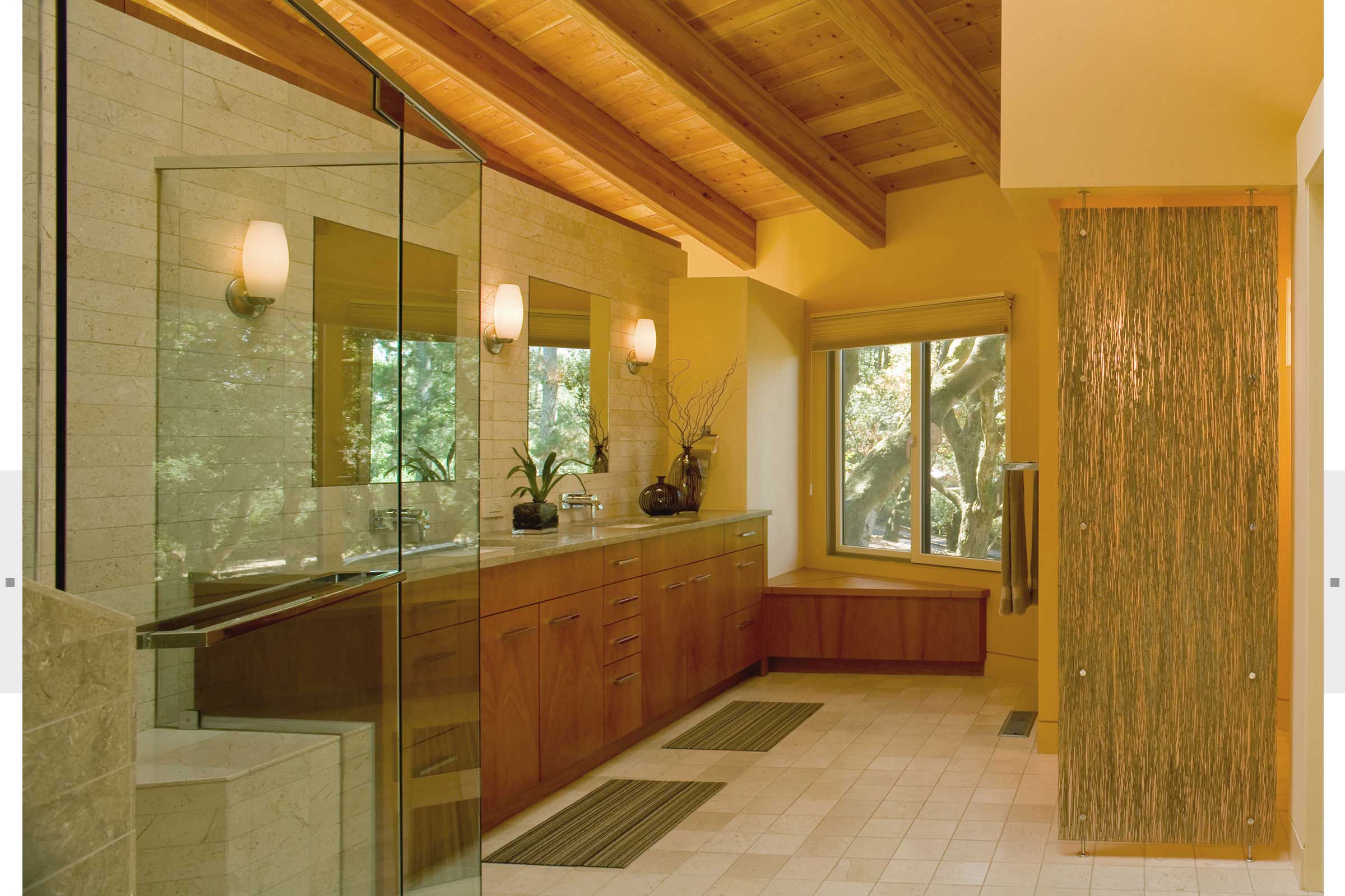 large bathroom with wood cabinetry and beamed ceilings