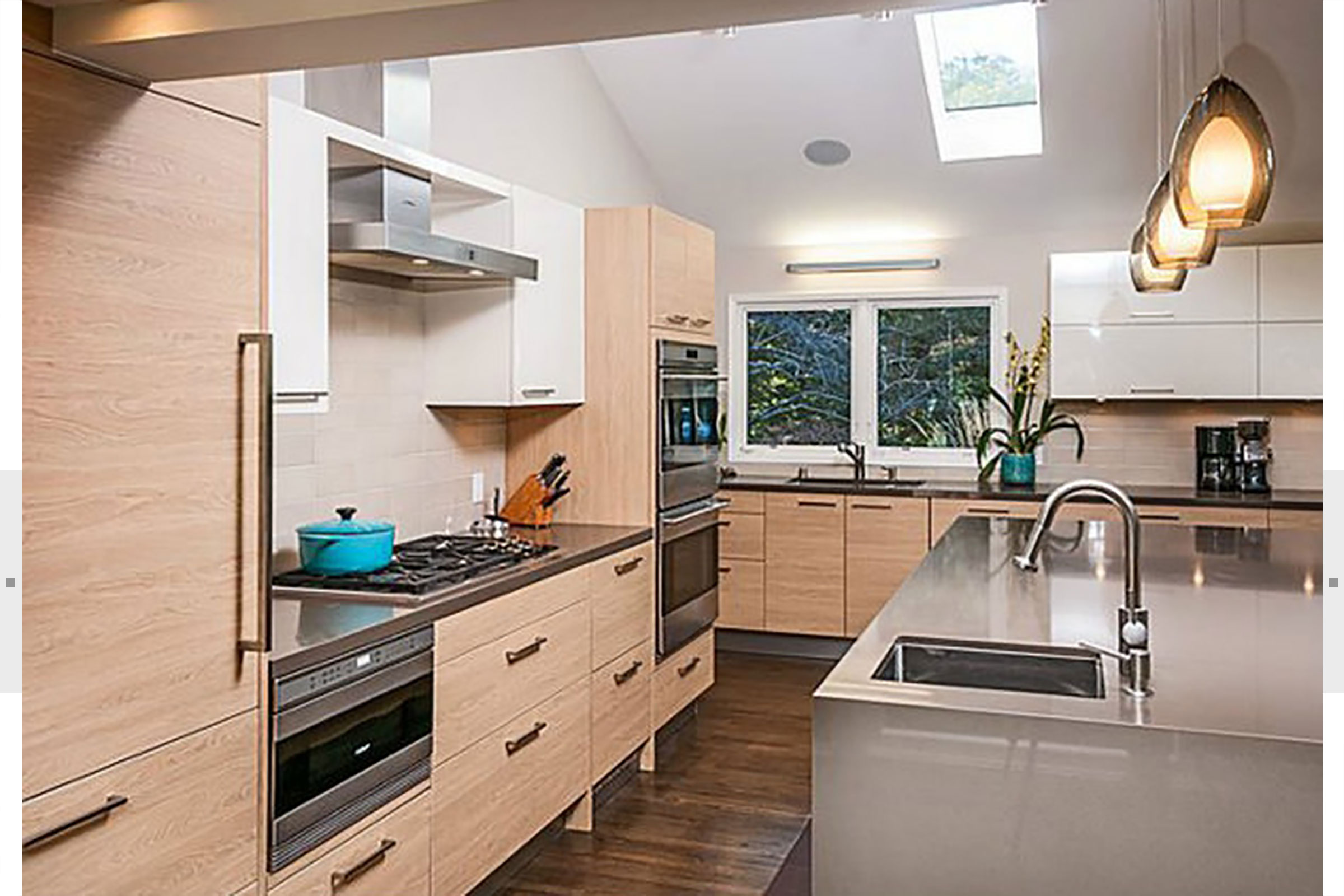 kitchen with wood cabinets and stainless island