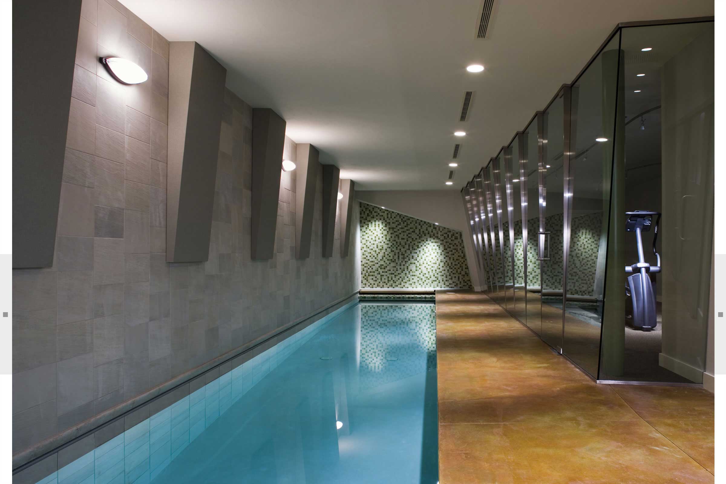 indoor lap pool and exercise room in home