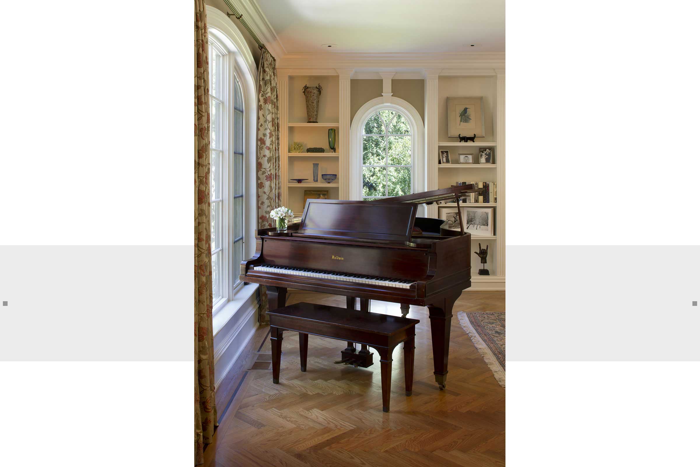 baby grand piano and parquet wood floors