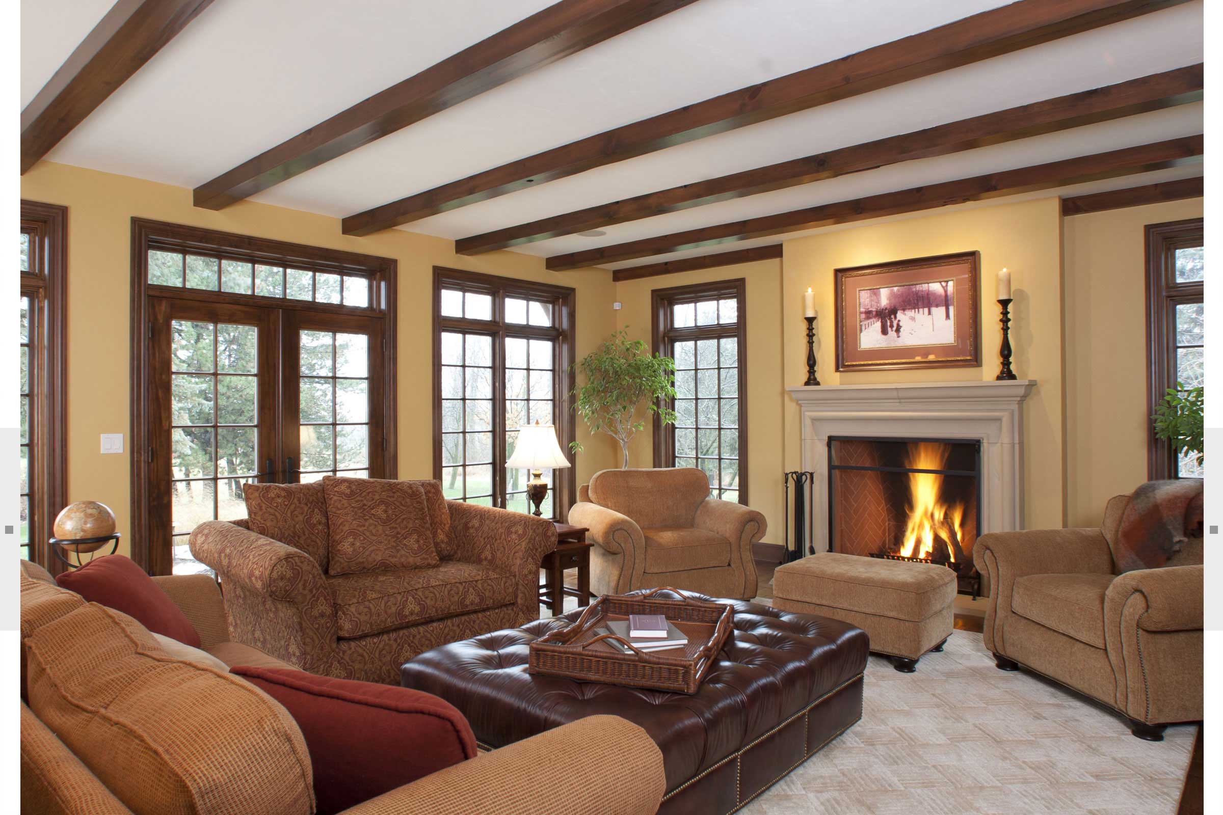 family room with fireplace and beamed ceilings