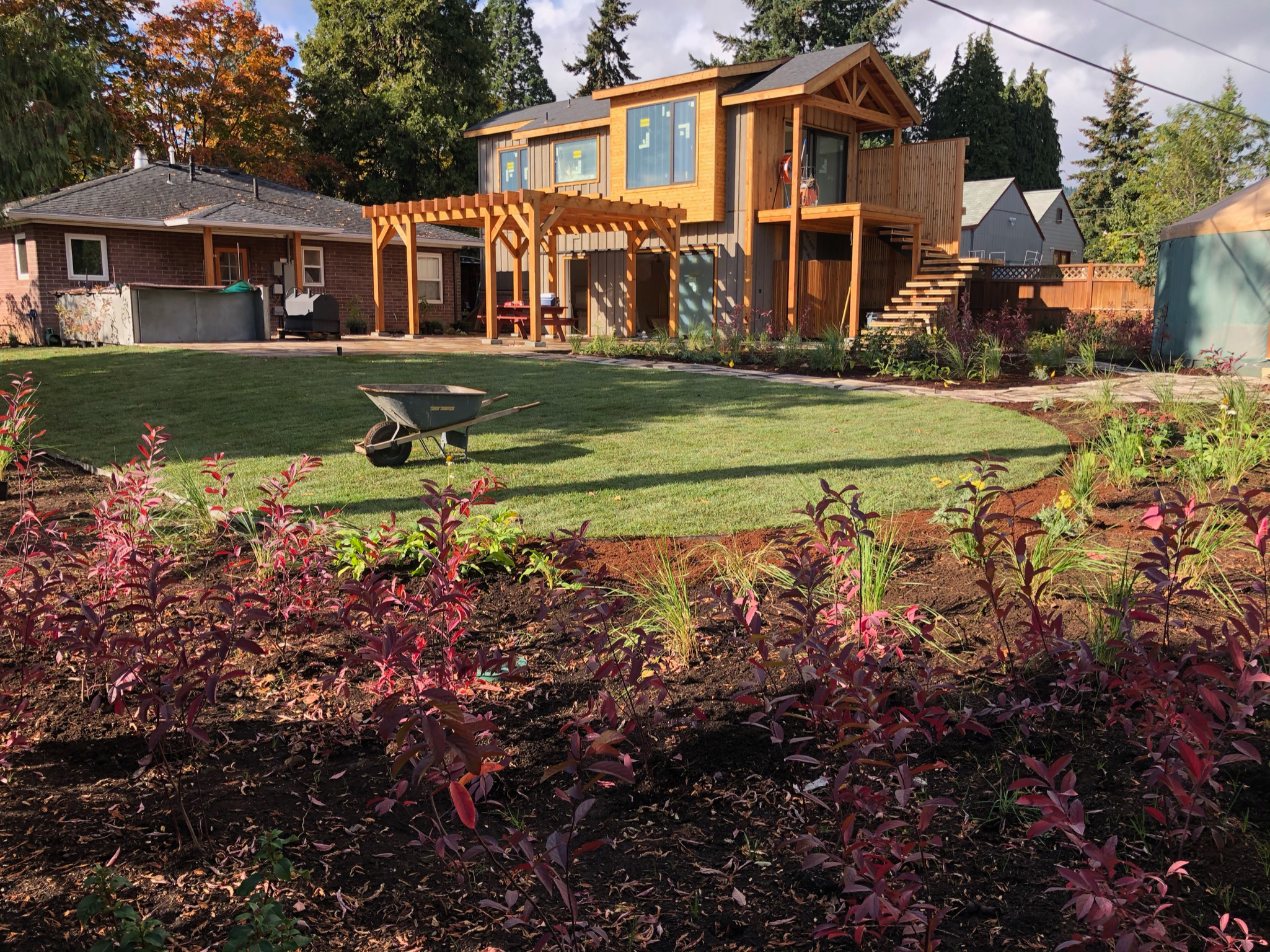 lawn and landscaping in rustic styled home